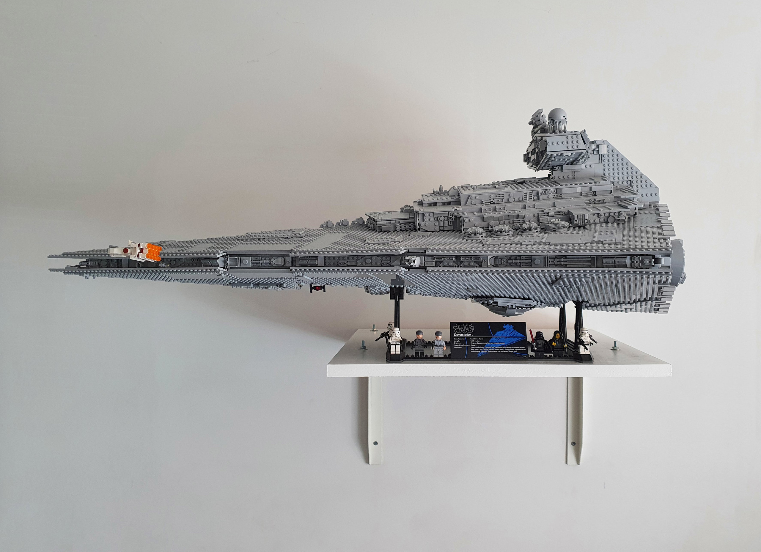 Building an Imperial Star Destroyer. A lot of grey bricks to put together, but damn it was worth it. Looks awesome on the wall!