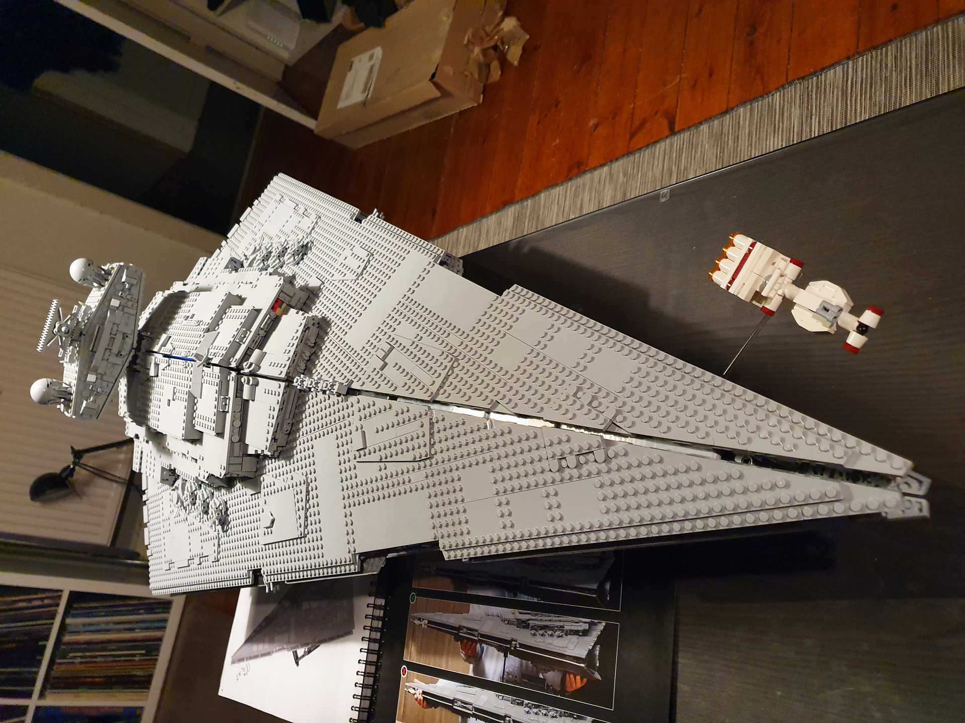 Building an Imperial Star Destroyer. A lot of grey bricks to put together, but damn it was worth it. Looks awesome on the wall!