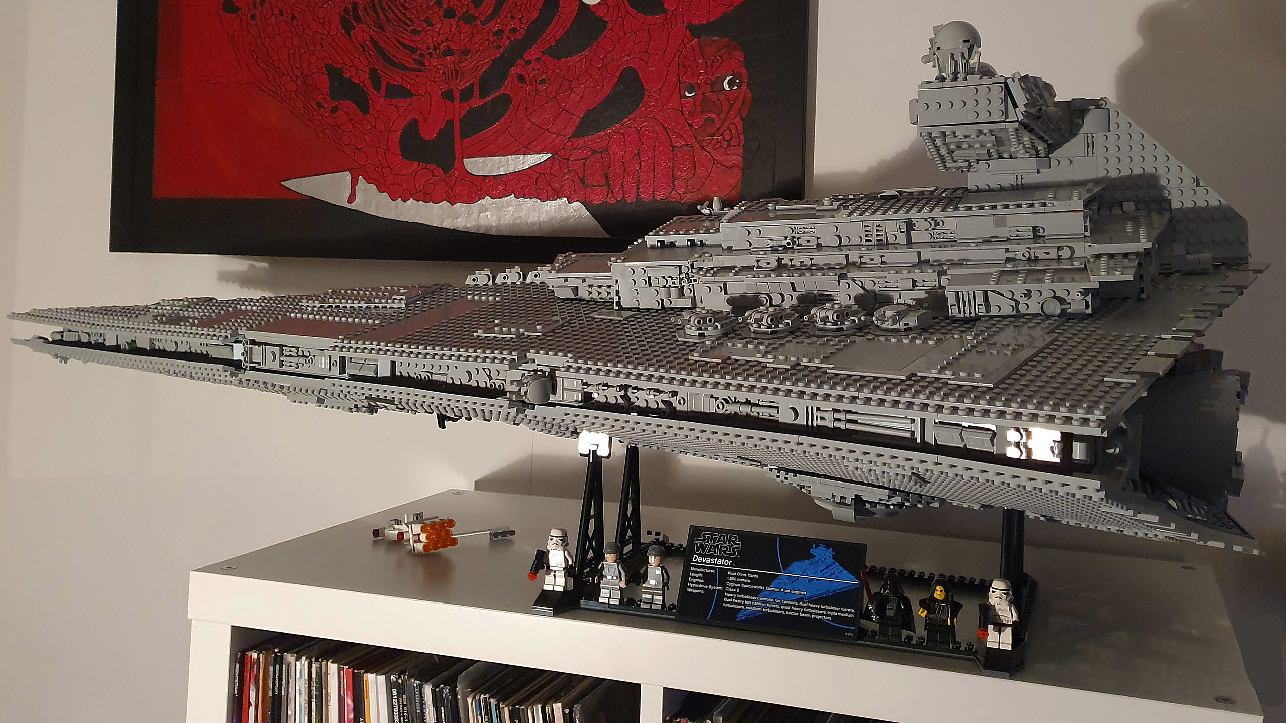 Building an Imperial Star Destroyer. A lot of grey bricks to put together, but damn it was worth it. Looks awesome on the wall!