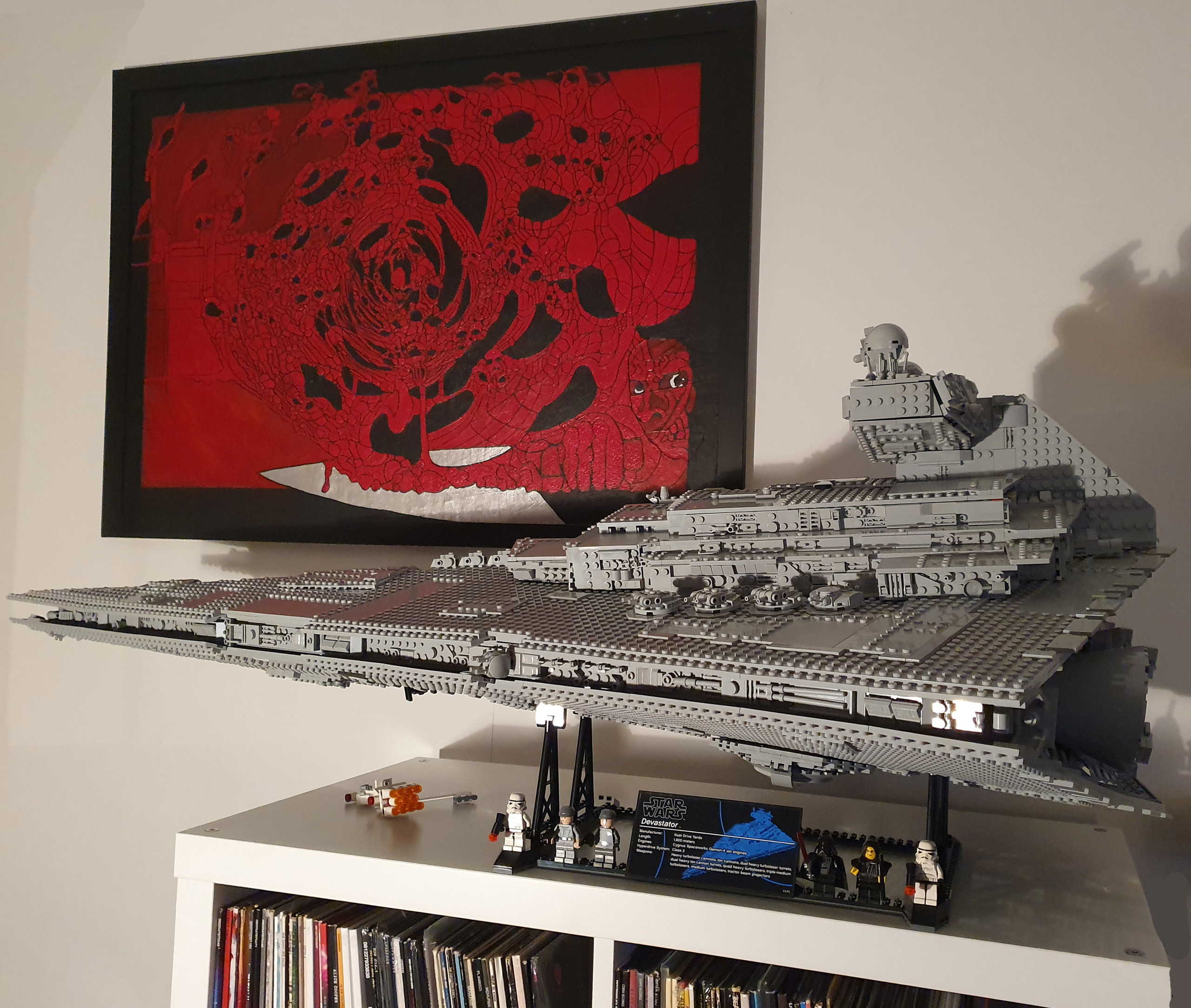 Building an Imperial Star Destroyer. A lot of grey bricks to put together, but damn it was worth it. Looks awesome on the wall!