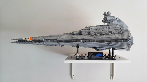Building an Imperial Star Destroyer. A lot of grey bricks to put together, but damn it was worth it. Looks awesome on the wall!