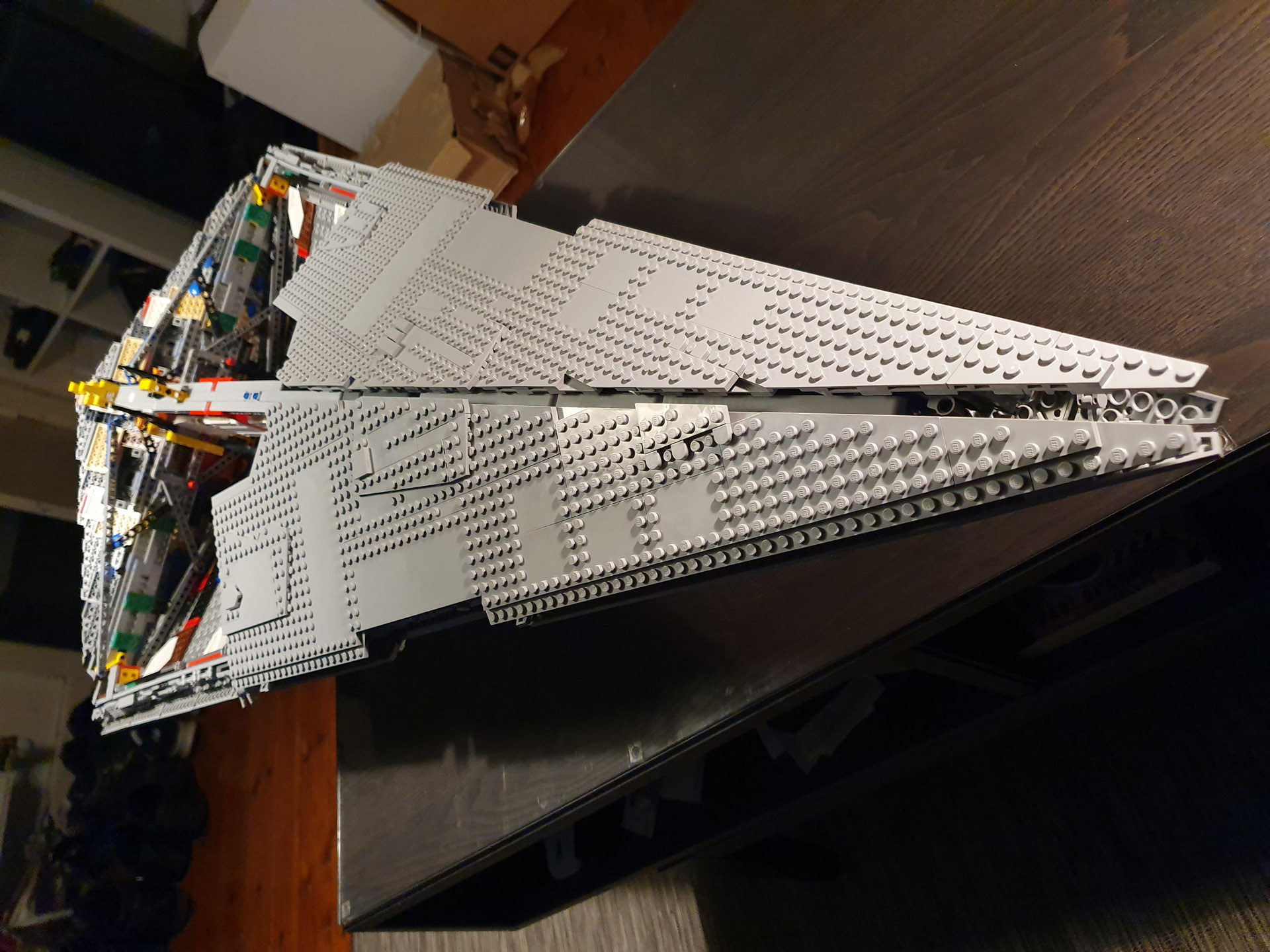 Building an Imperial Star Destroyer. A lot of grey bricks to put together, but damn it was worth it. Looks awesome on the wall!